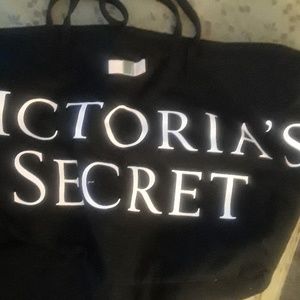 Victoria's Secret tote bag.